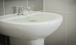 Overflowing Sink Water Damage - Restoration 1